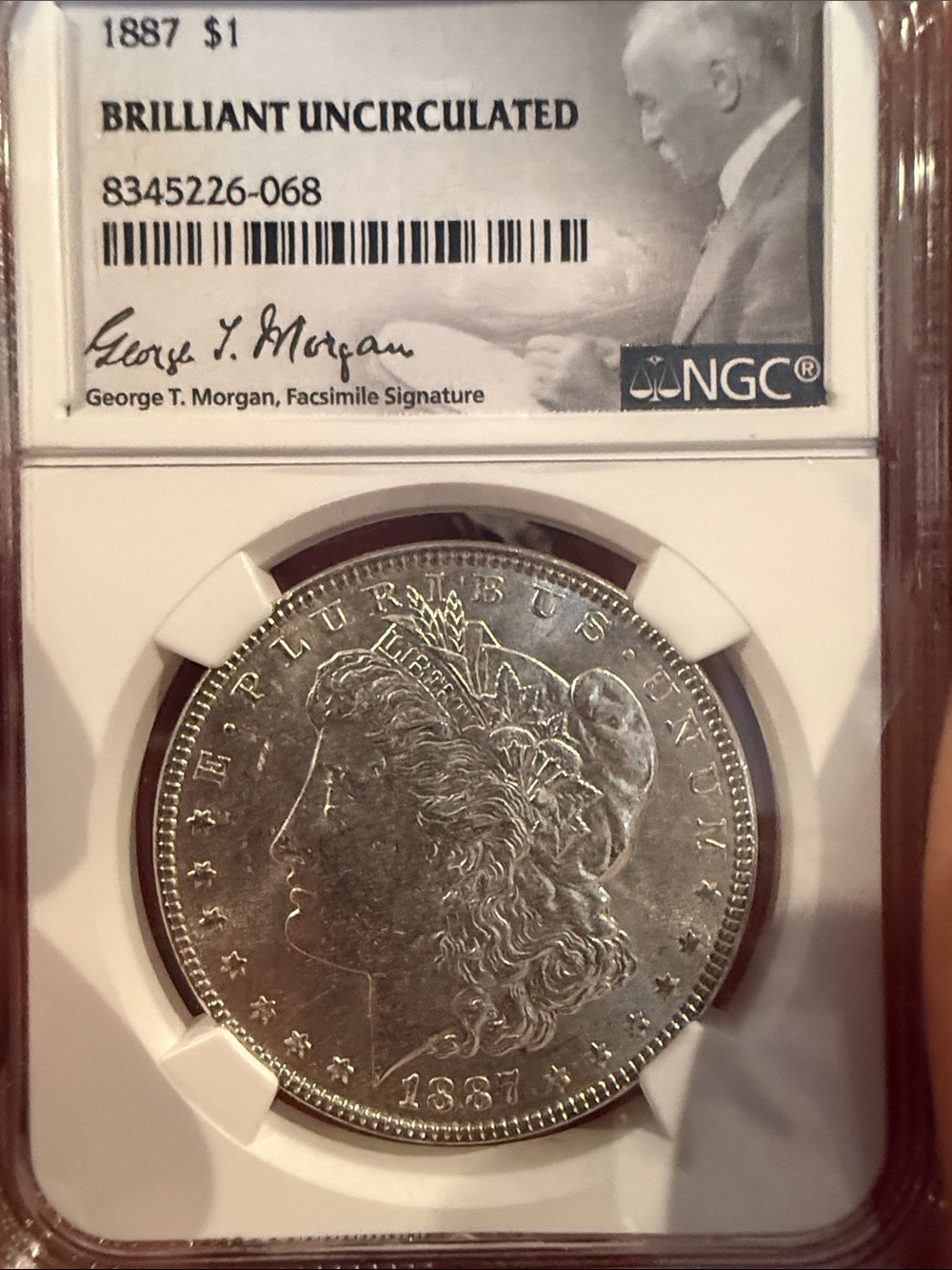 Certified Morgan Silver Dollar in NGC Holder - Silver Tone
